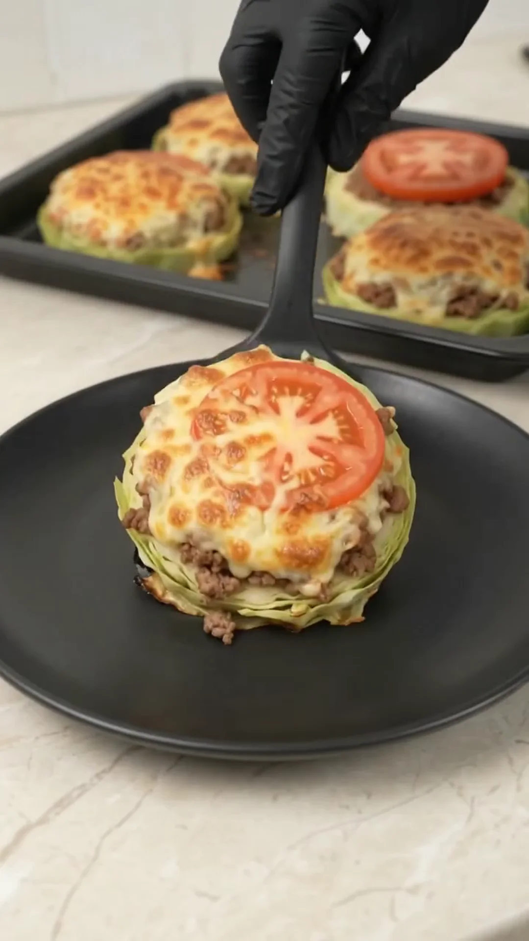 Baked Cabbage Steaks with Ground Beef, Tomato and Cheese