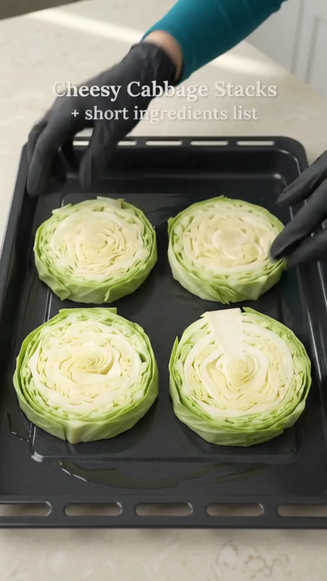 Baked Cabbage Steaks with Ground Beef, Tomato and Cheese – placing cabbage slices on a baking tray