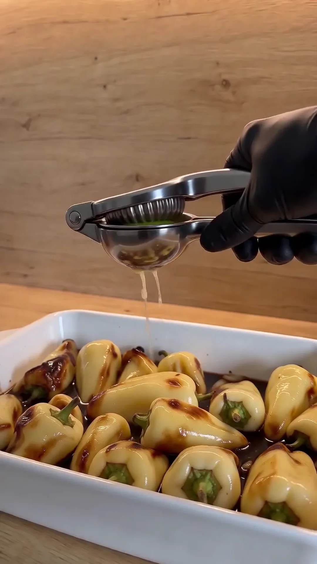 Blistered Caribe Chiles in Citrus Soy Marinade – juicing peppers, possibly for a recipe