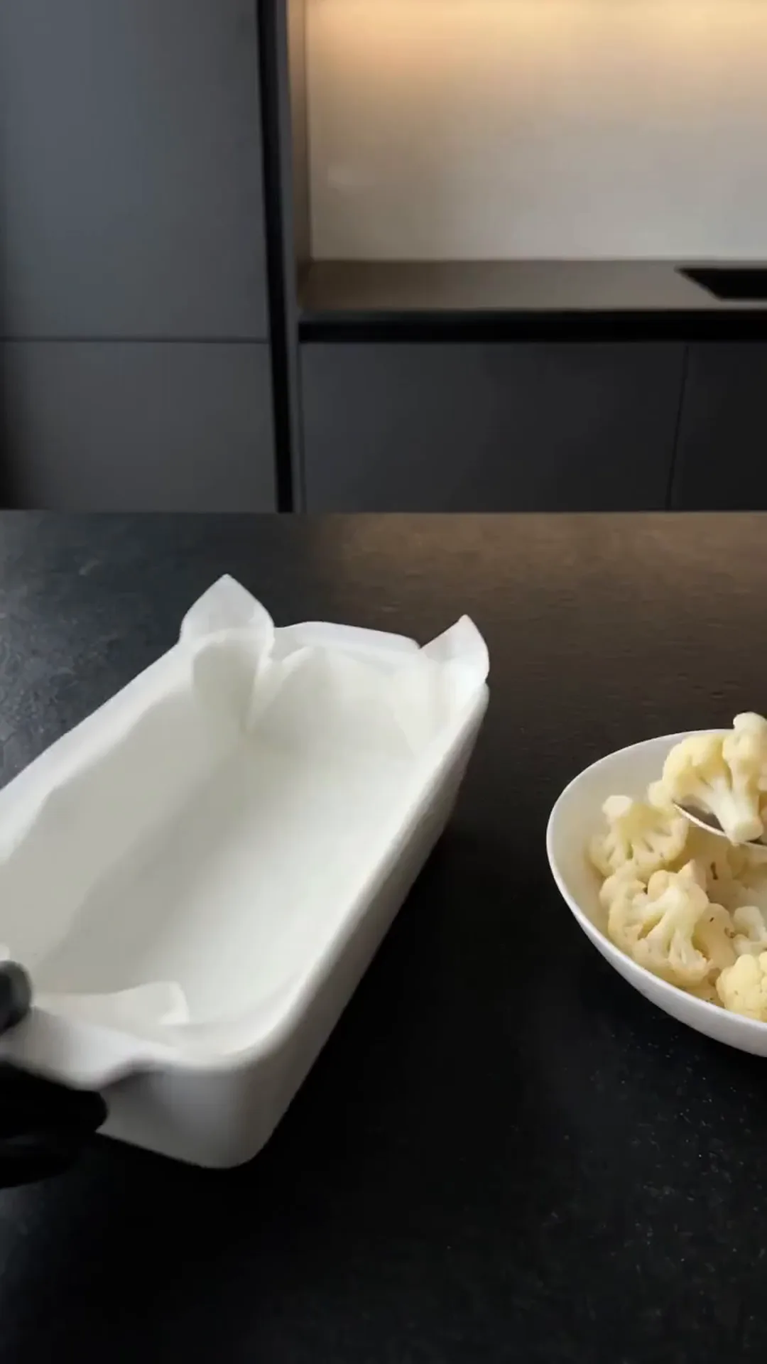 Cheesy Cauliflower and Smoked Turkey Casserole Bake – Preparing a dish with cauliflower, likely a side or main course