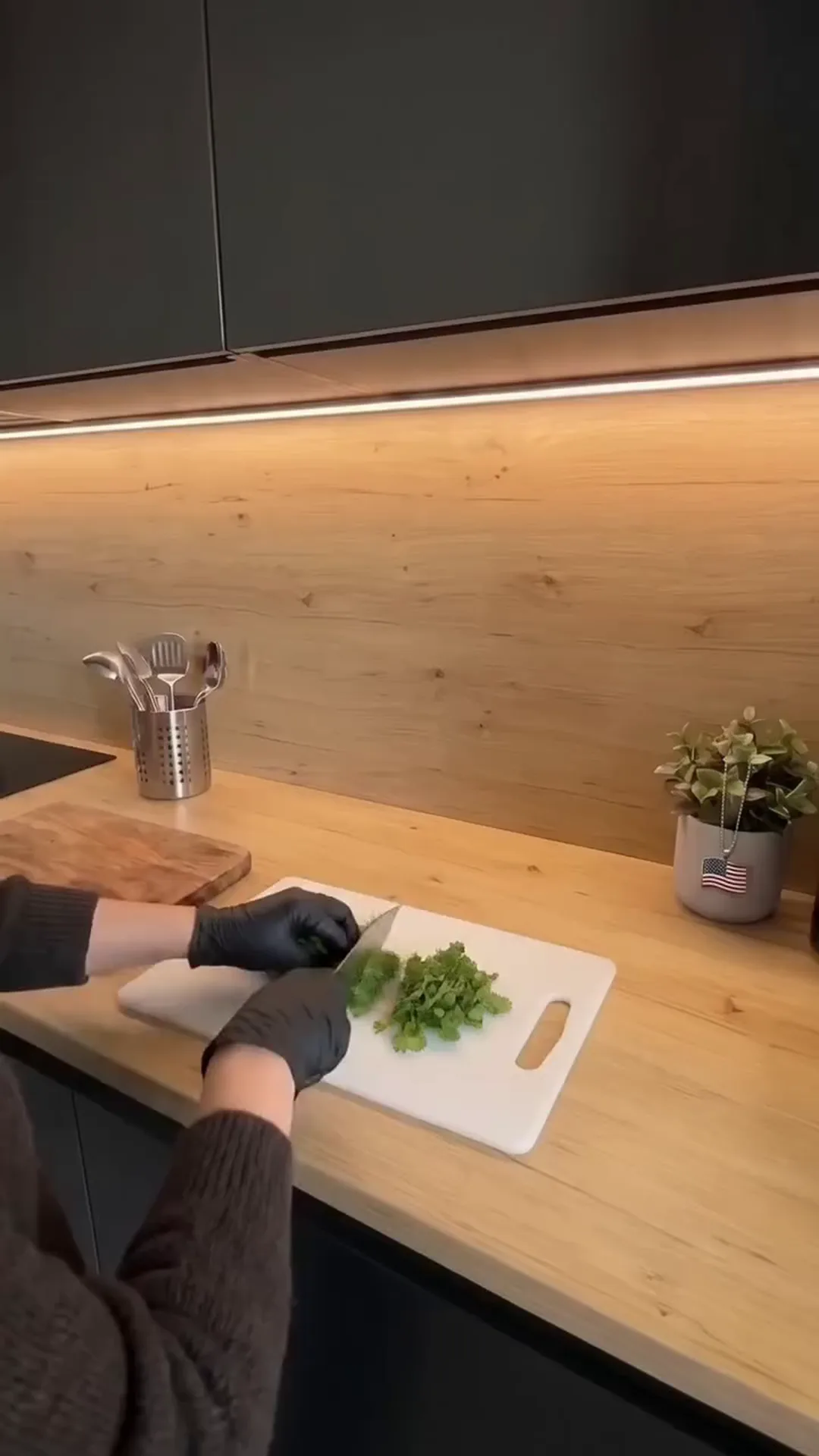 Creamy Smoked Brisket Queso Dip Recipe – person chopping vegetables on a kitchen counter