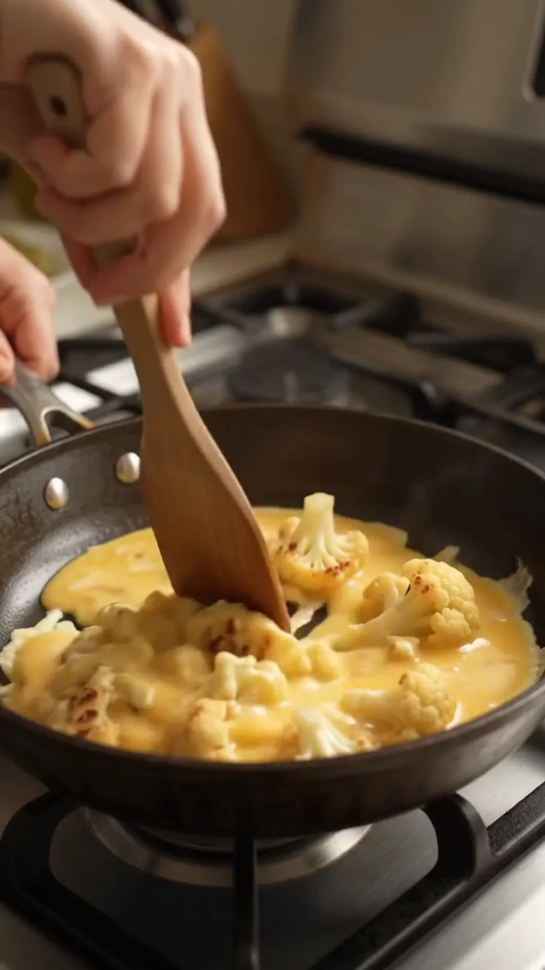 Easy Pan Fried Cauliflower and Eggs with Fresh Dill – stirring a cauliflower dish in a pan