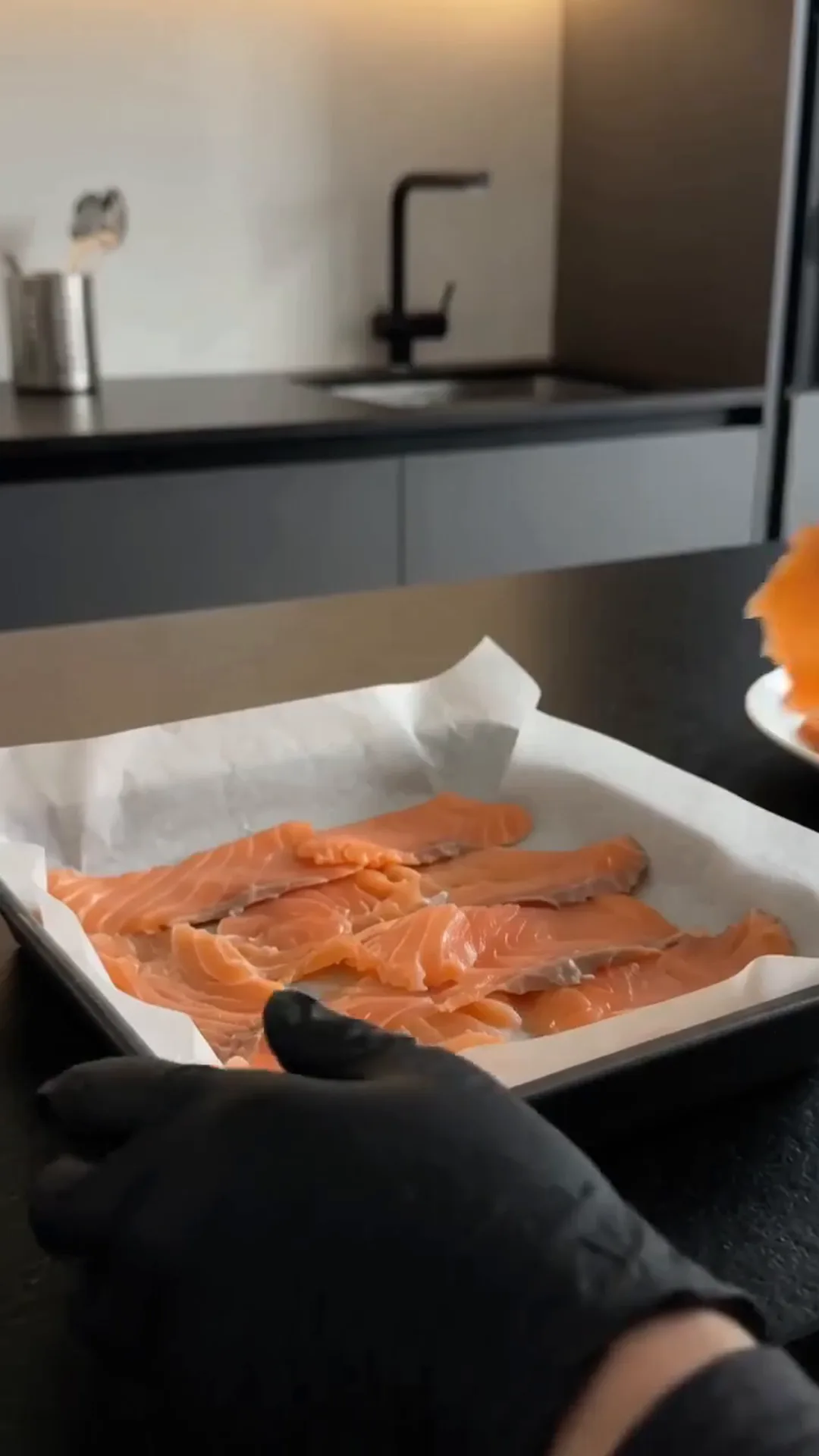Easy Salmon Avocado Sushi Squares with Spicy Mayo – person preparing salmon fillets for cooking