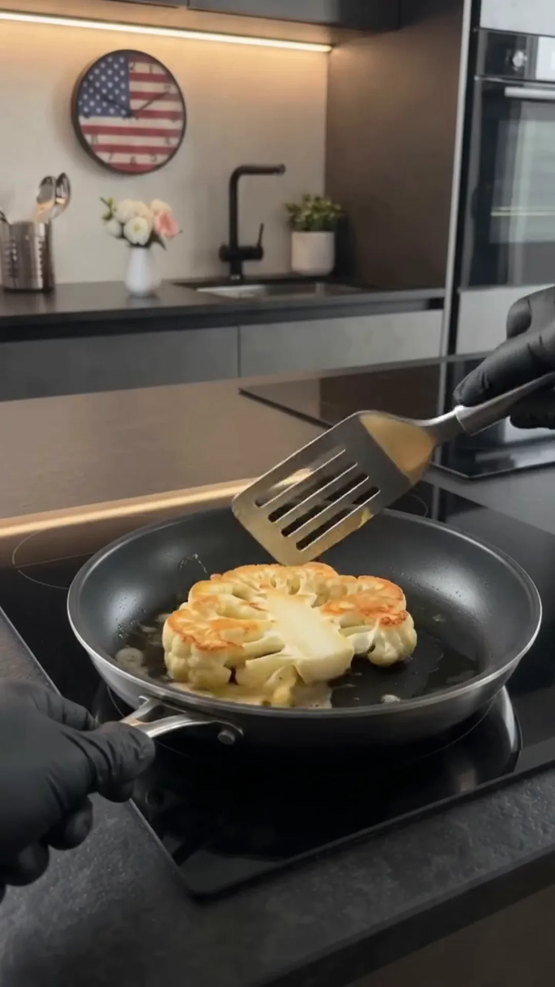 Golden Cheesy Tomato Cauliflower Steaks Recipe – Cooking a cauliflower steak in a pan