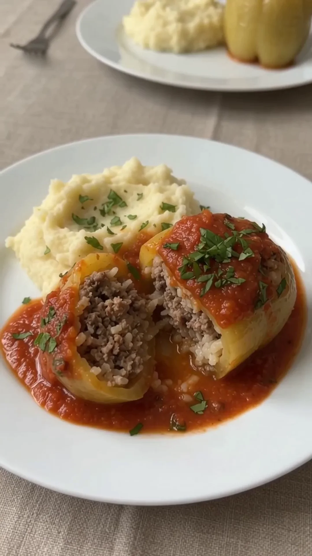 Hearty Stuffed Peppers with Beef and Rice over Mashed Potatoes