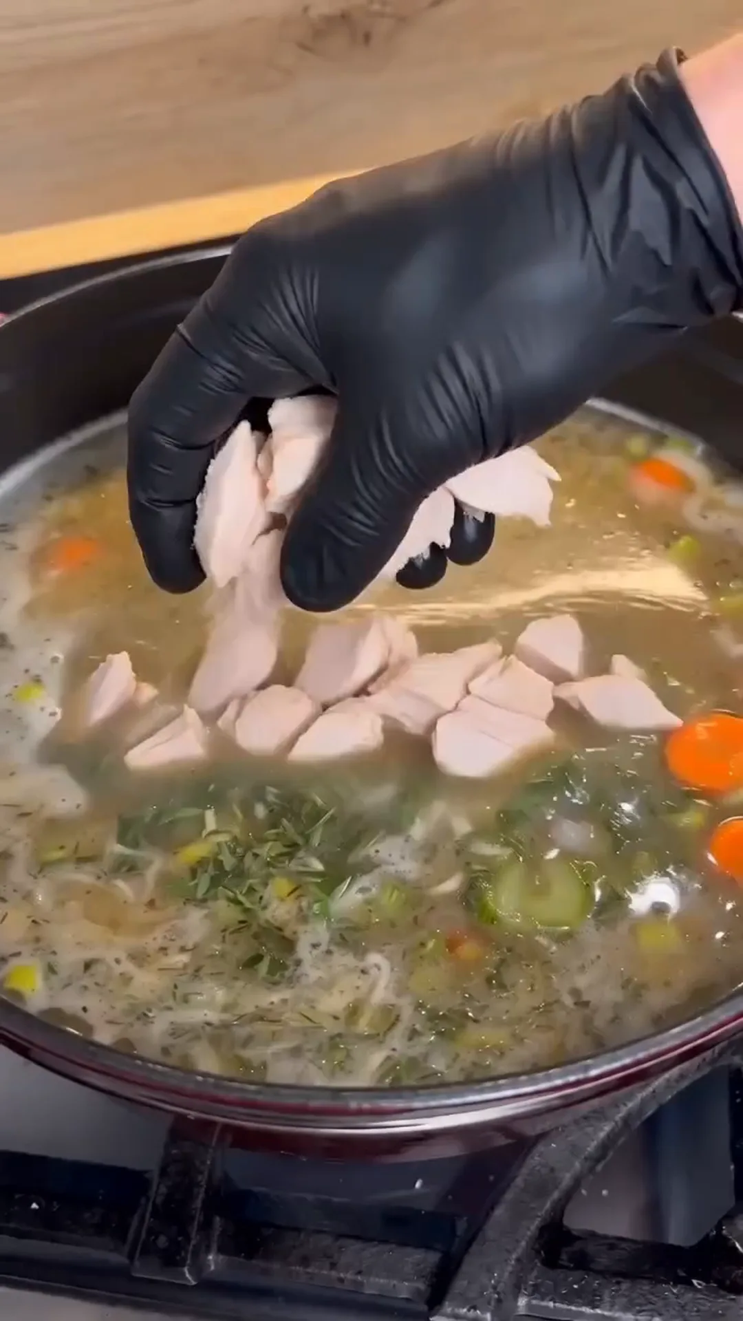 Hearty Turkey and Dumplings Soup with Herb Broth – Adding chicken to a soup or stew