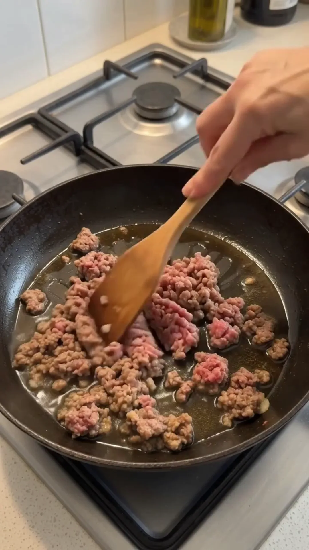 High Fiber Savory Cabbage and Ground Beef Skillet – Cooking ground meat in a pan, likely for a recipe