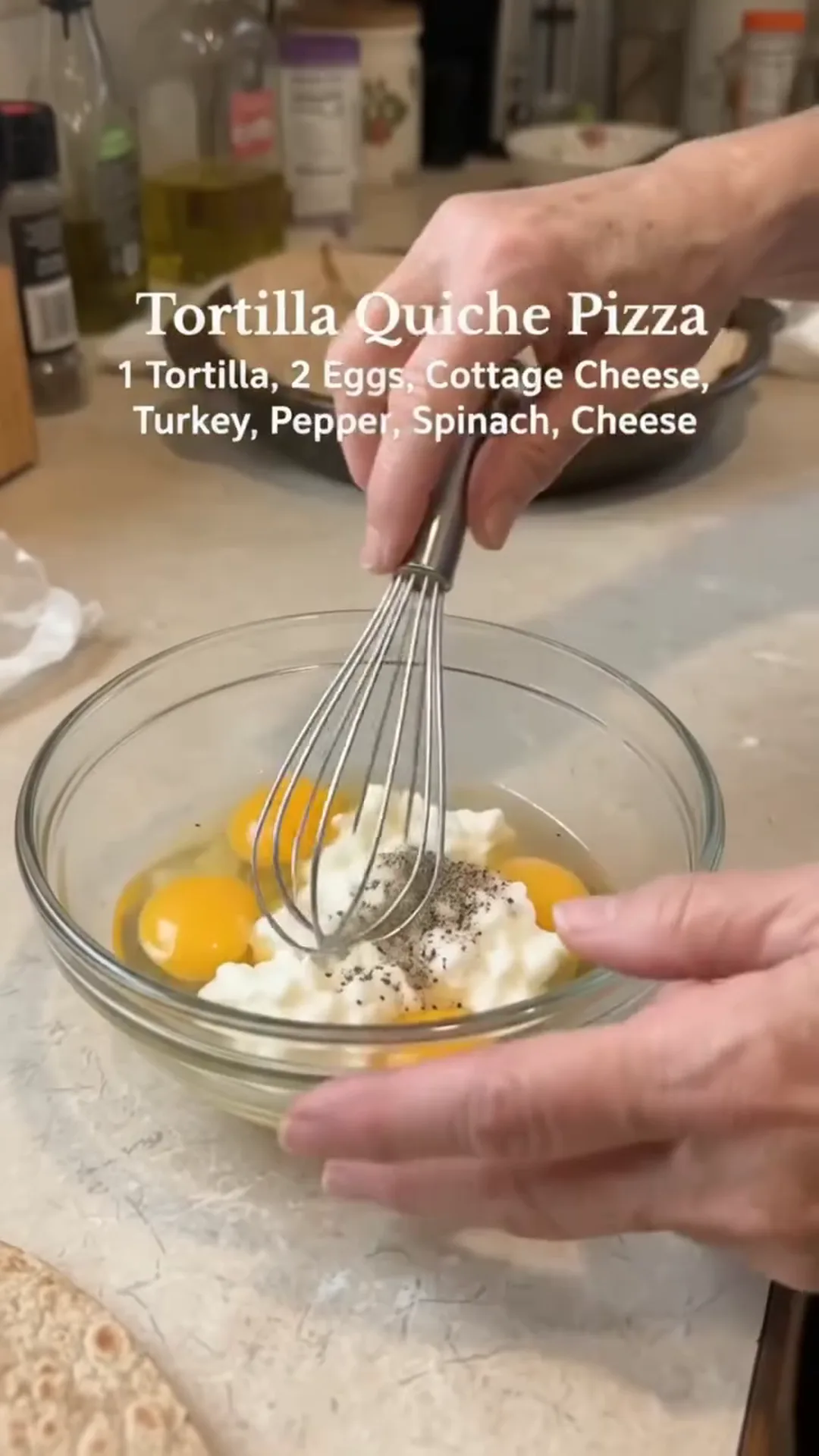 Quick Cauliflower Pizza Steaks with Smoked Turkey and Cheese – whisking eggs in a bowl