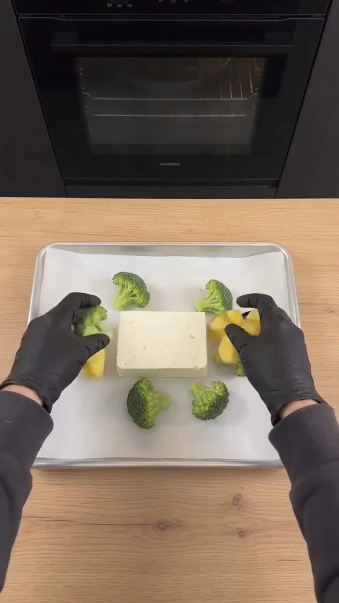 Roasted Broccoli and Feta Soup with Roasted Garlic – Placing broccoli and cheese on a baking tray