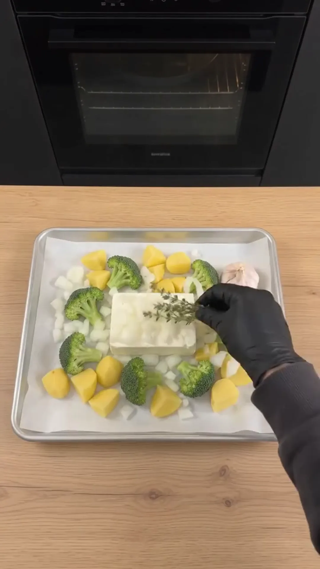 Roasted Broccoli and Feta Soup with Roasted Garlic – Preparing a tray of vegetables and cheese for roasting