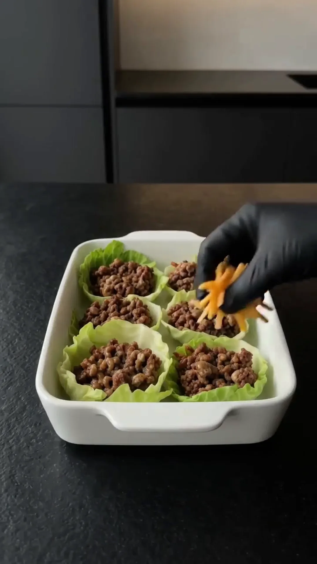 Savory Cheeseburger Cabbage Cups with Melted Cheese – adding shredded cheese to lettuce cups