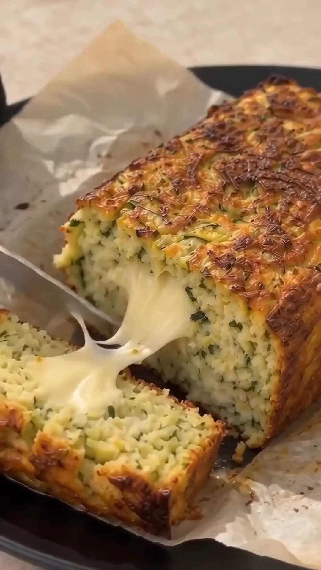 Savory Cheesy Baked Zucchini Loaf with Melted Center