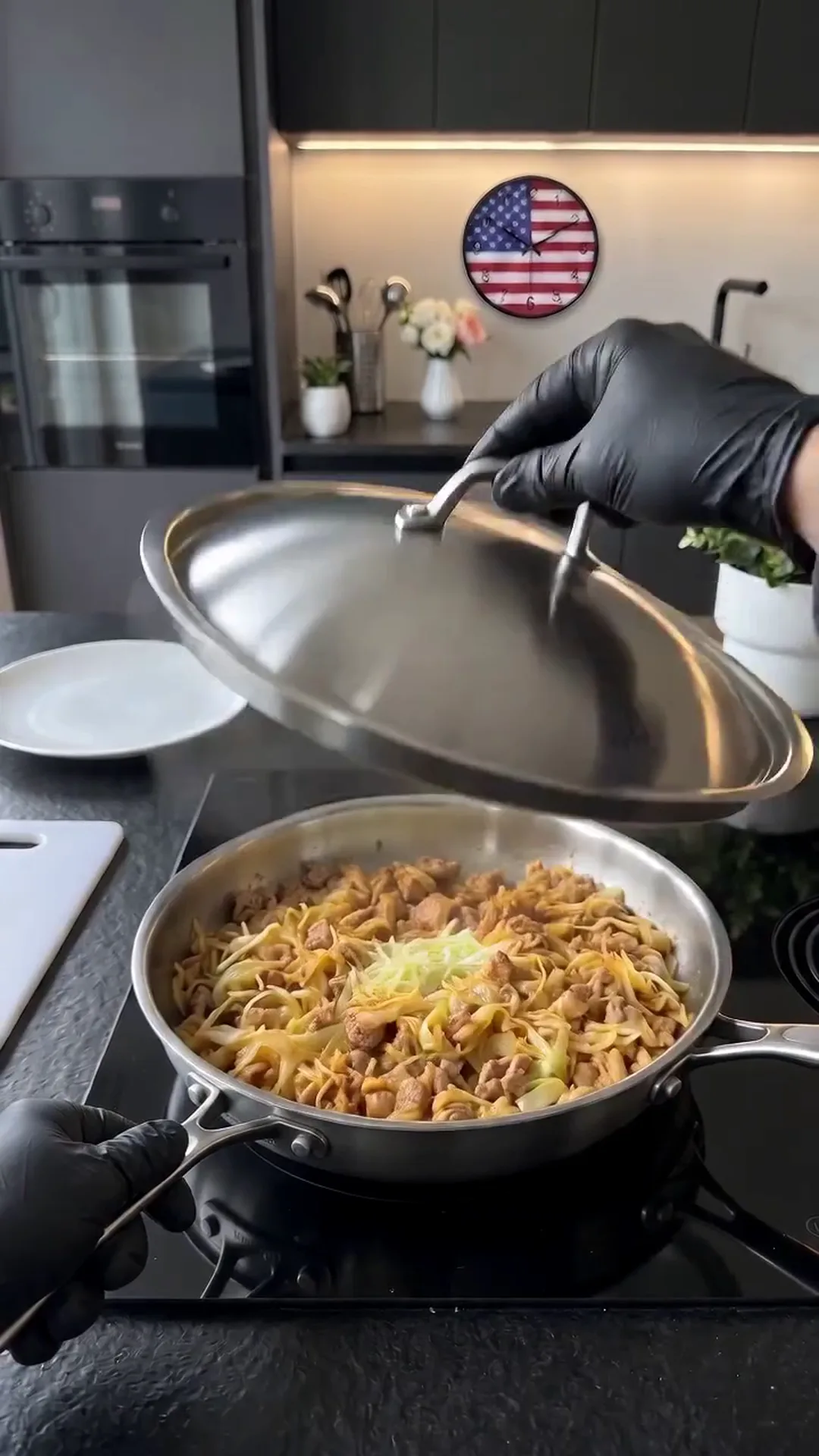 Savory Pan-Seared Cabbage and Ground Chicken Skillet Recipe – A person is cooking a pasta dish in a pan