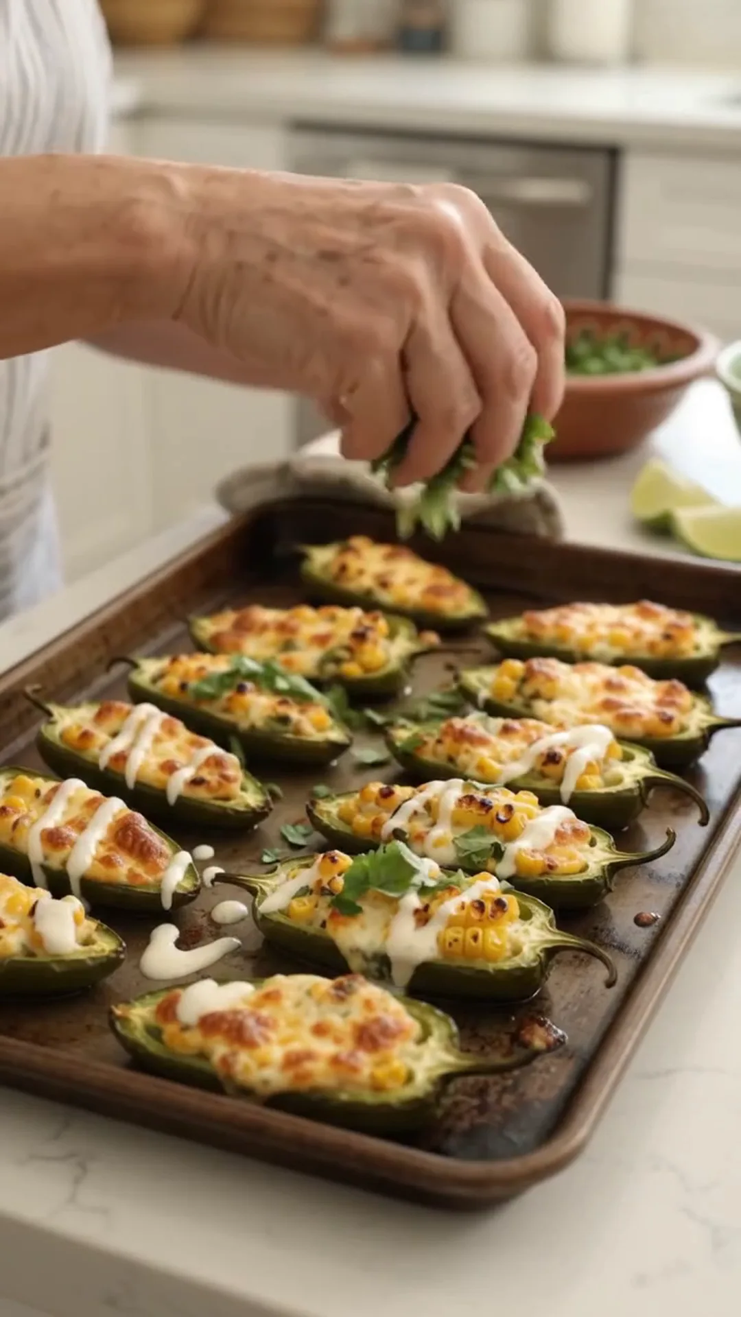 Spicy Mexican Street Corn Jalapeño Poppers Recipe – Sprinkling cheese on stuffed peppers