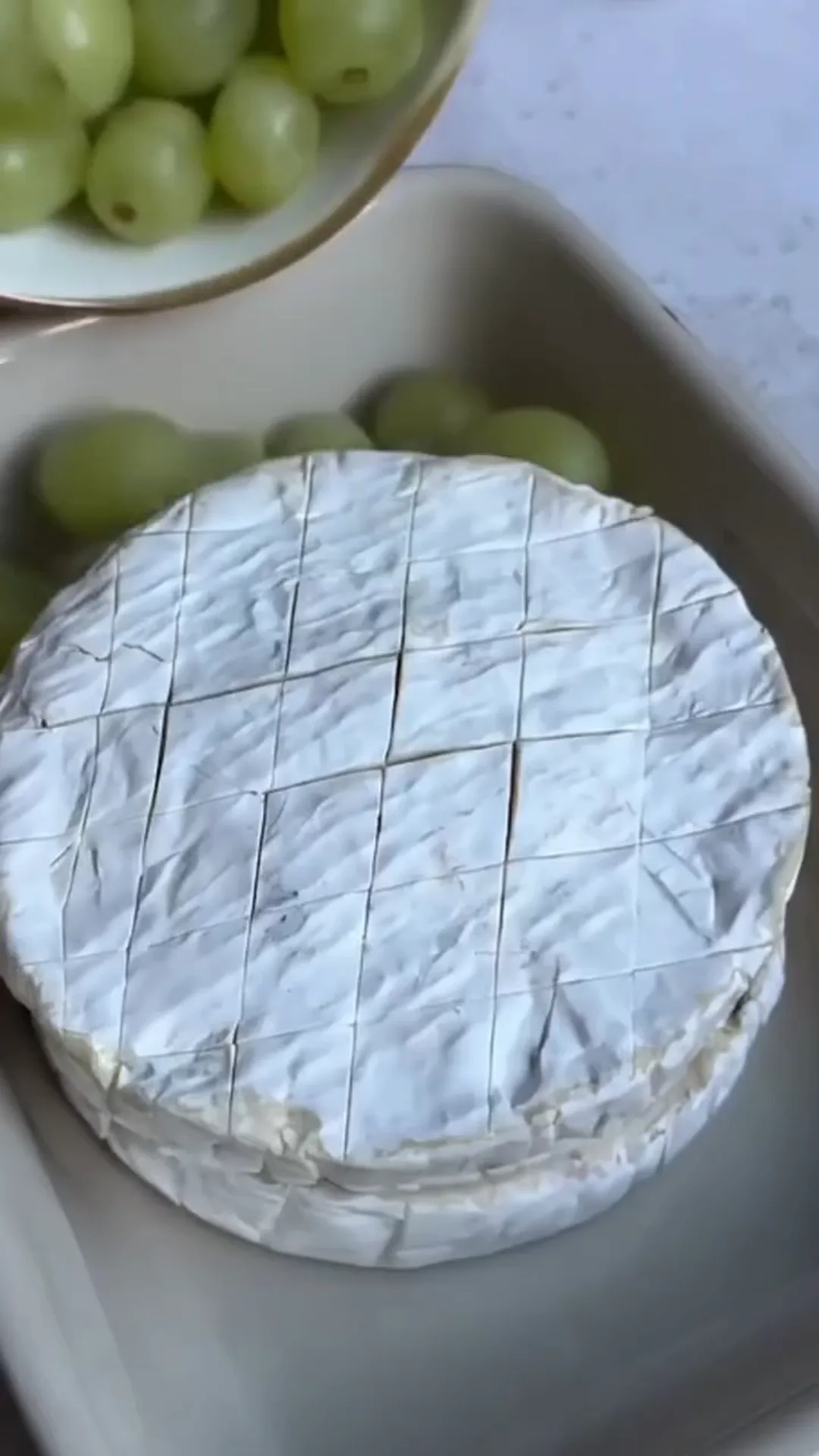 Warm Baked Camembert with Sweet Berries and Roasted Grapes – baking a round cheese in an oven