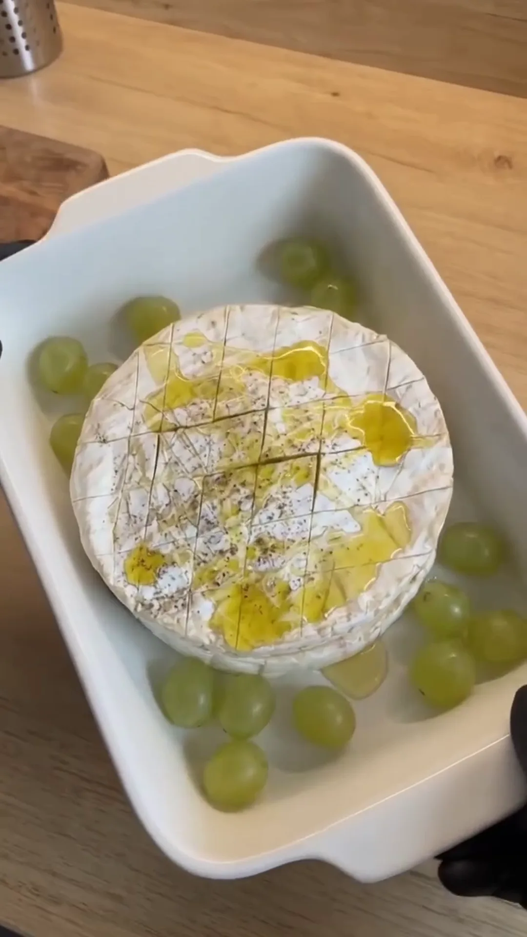 Warm Baked Camembert with Sweet Berries and Roasted Grapes – baked cheese with grapes, possibly a recipe