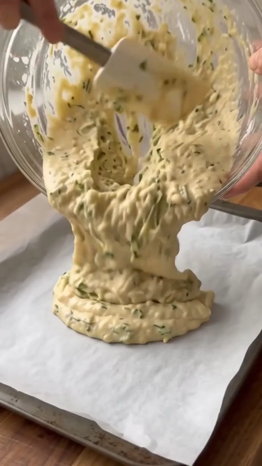 Zucchini Tawouk Flatbread with Savory Chicken – mixing a batter in a bowl